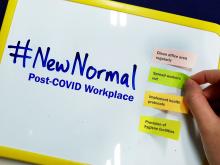 Can employers justify paying workers who return to the office more than those who work from home?